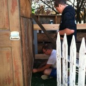 Dad showing son how to do it. He may not want to build things but he will know how!!! Love my gate by the way!